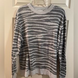 Cute grey zebra print sweater.